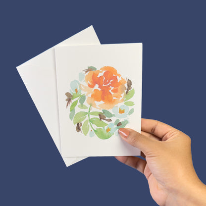 Orange Rose with blue flowers greeting card