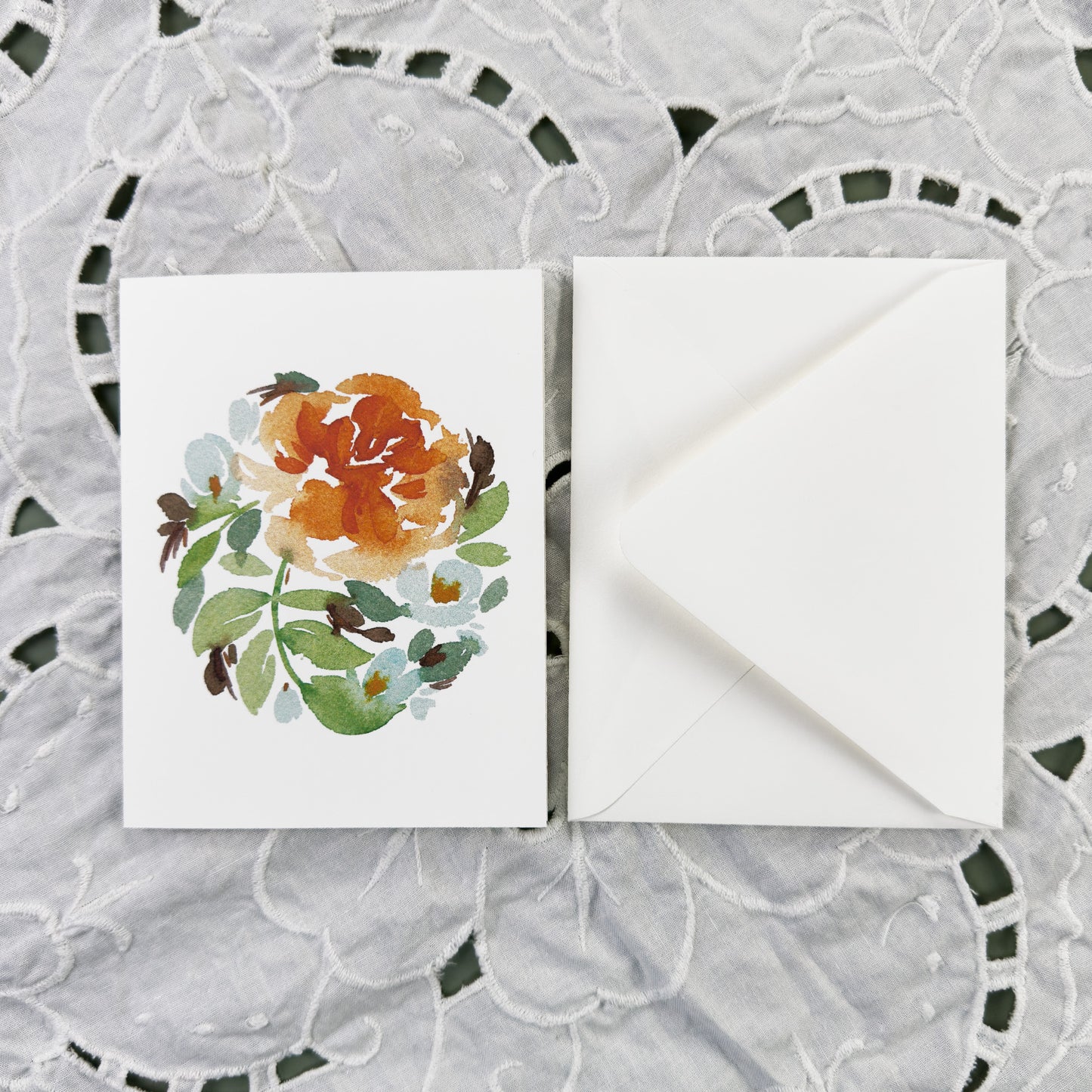 Orange Rose with blue flowers greeting card