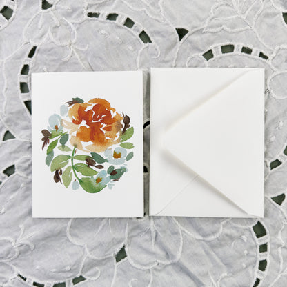 Orange Rose with blue flowers greeting card